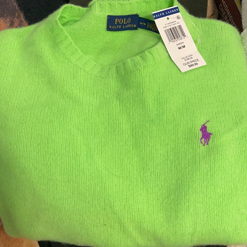 Never worn cashmere sweater, tags still on .